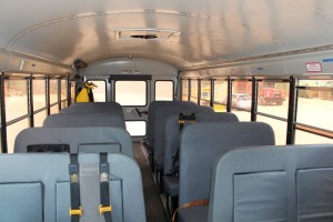 Mid-size bus inside school_bus charter_bus